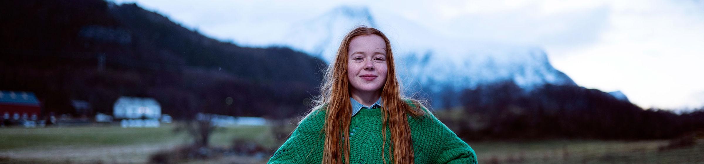 Girl in green sweater